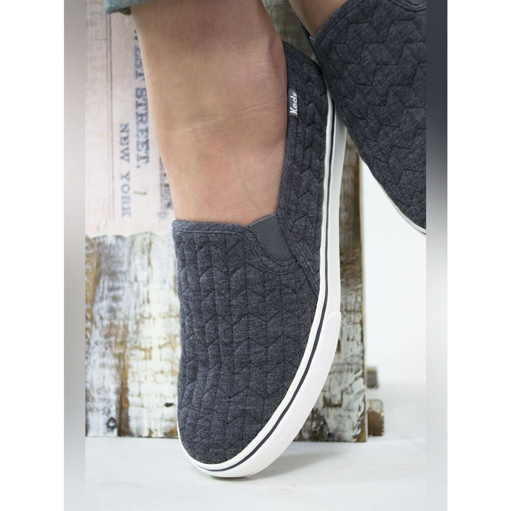 Keds Quilted Slip-On Sneakers in Charcoal Gray and White